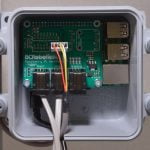 Raspberry Pi Weather HAT and Raspberry Pi installed in weatherproof box